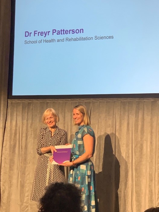 Dr Freyr Patterson receiving her award