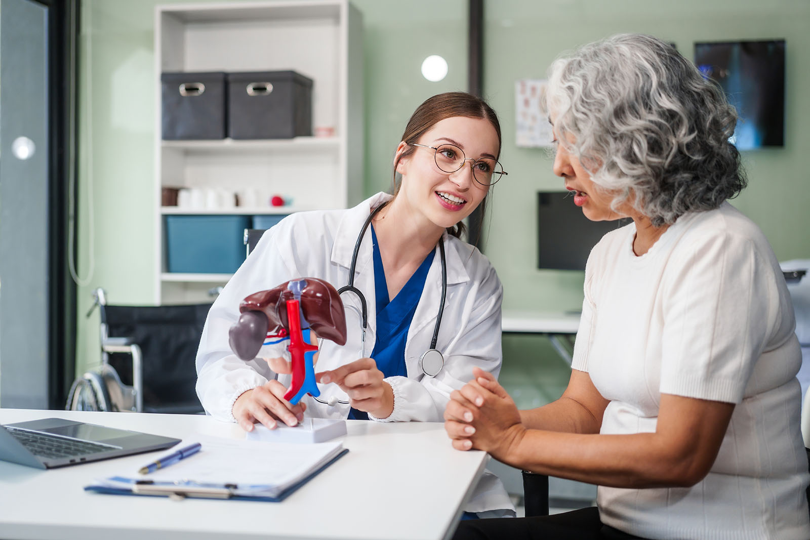 A doctor talking to her patient