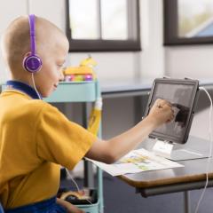 boy doing telerehabilitation